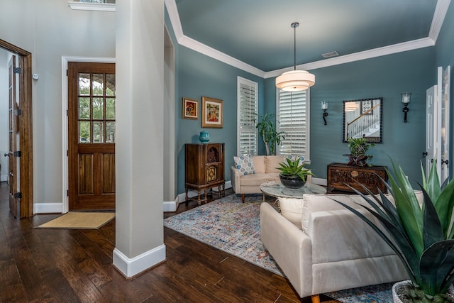 living area featuring ornamental molding and dark wood-type flooring