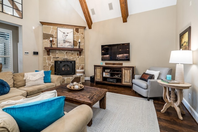 living room with beamed ceiling, dark wood-type flooring, a fireplace, and high vaulted ceiling