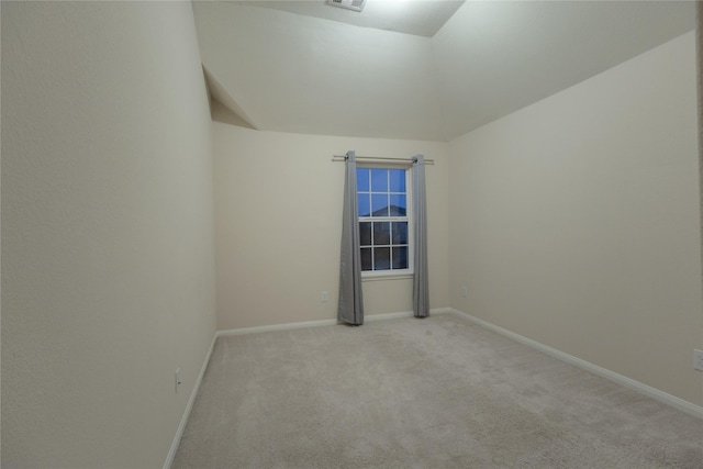 unfurnished room with light carpet