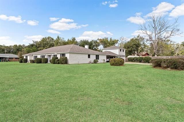 exterior space featuring a yard