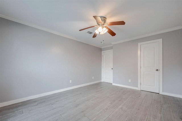 unfurnished room featuring light hardwood / wood-style flooring, ceiling fan, and ornamental molding