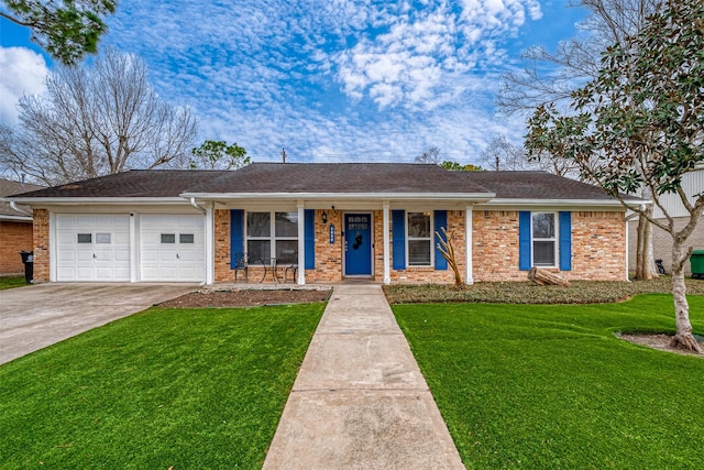 ranch-style home featuring a front lawn and a garage