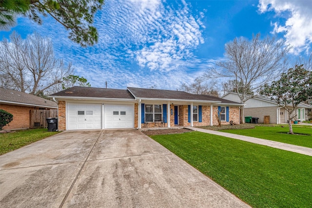 ranch-style home with a front yard and a garage