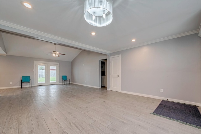 unfurnished living room featuring light wood-type flooring, vaulted ceiling, ceiling fan, and crown molding