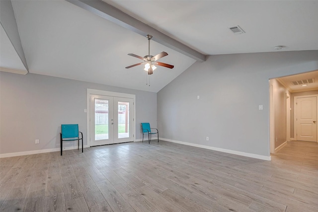 unfurnished room with ceiling fan, french doors, vaulted ceiling with beams, and light hardwood / wood-style flooring