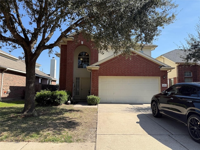 view of front of property featuring a garage