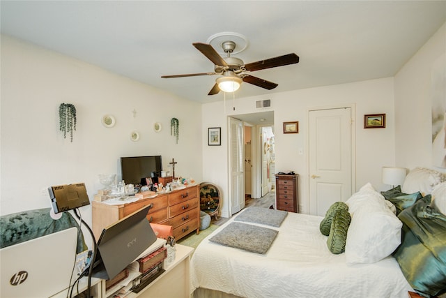 bedroom with a ceiling fan and visible vents