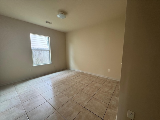 view of tiled empty room