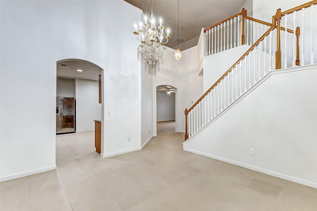 entrance foyer with a towering ceiling