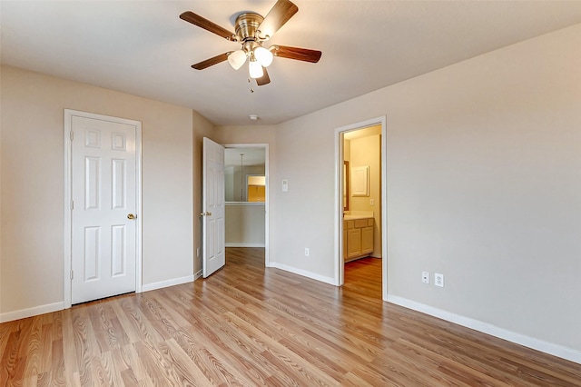 unfurnished bedroom with ceiling fan, connected bathroom, and light hardwood / wood-style floors