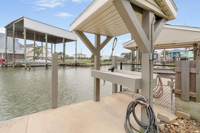 dock area with a water view