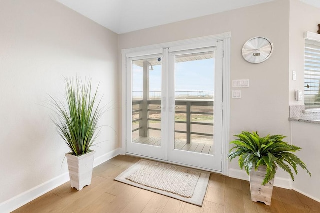 doorway to outside featuring light hardwood / wood-style flooring