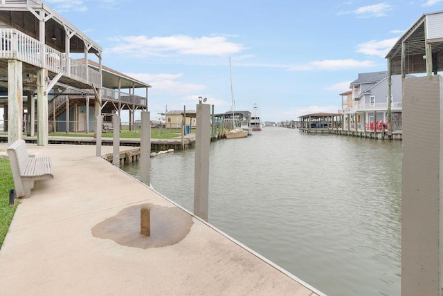 dock area with a water view