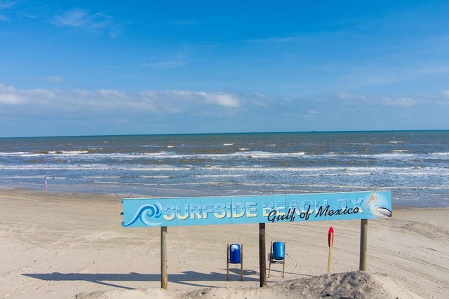 view of water feature with a beach view