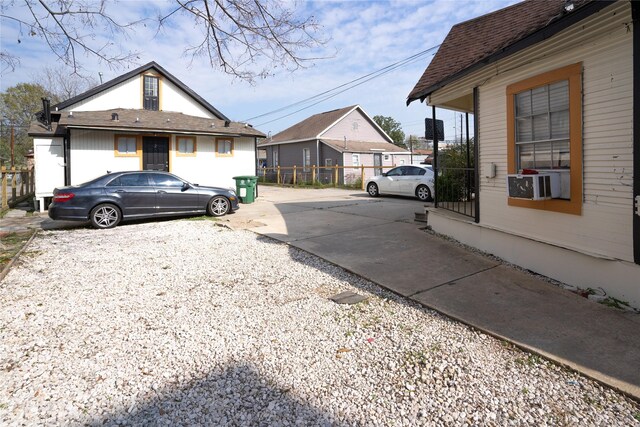 view of side of property featuring cooling unit