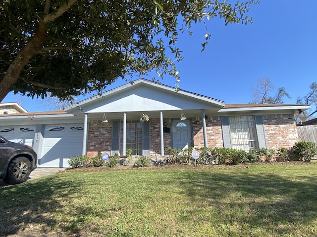 ranch-style house with a garage and a front yard