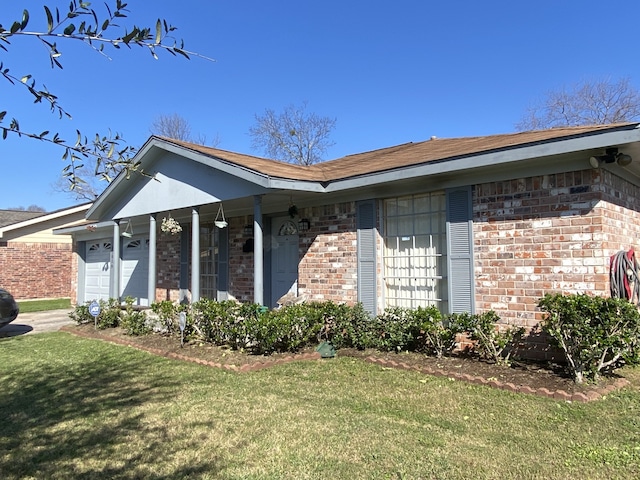 view of property exterior with a garage and a yard