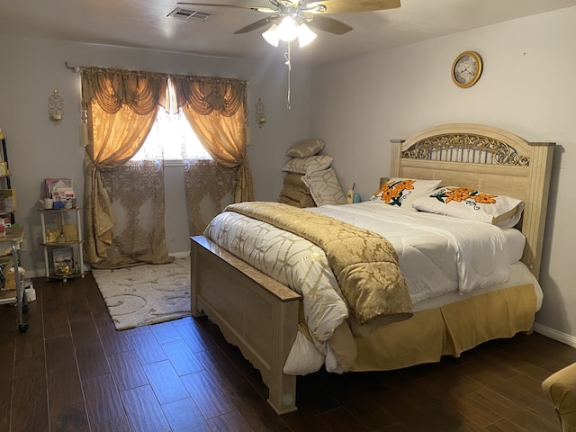 bedroom featuring dark wood-type flooring and ceiling fan