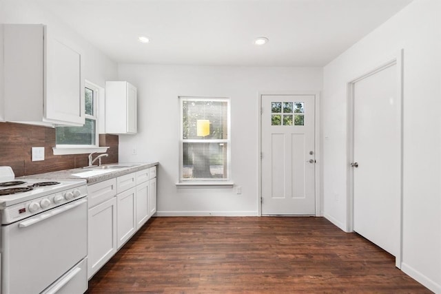 kitchen featuring white cabinetry, sink, dark wood-type flooring, and white electric range oven