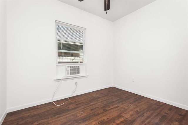 unfurnished room featuring dark wood-type flooring, ceiling fan, and cooling unit