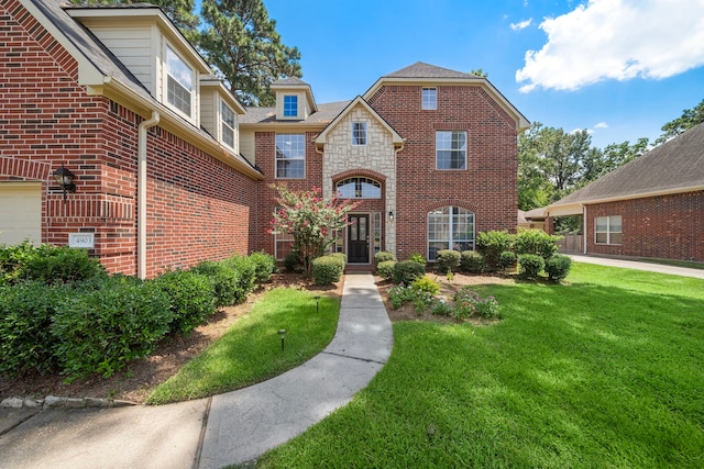 view of front of property with a front lawn