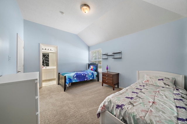 carpeted bedroom featuring vaulted ceiling