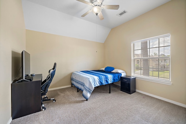 carpeted bedroom featuring vaulted ceiling and ceiling fan