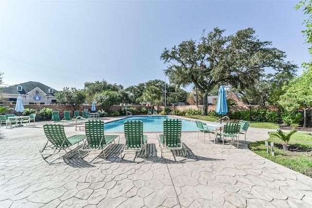 view of pool with a patio area