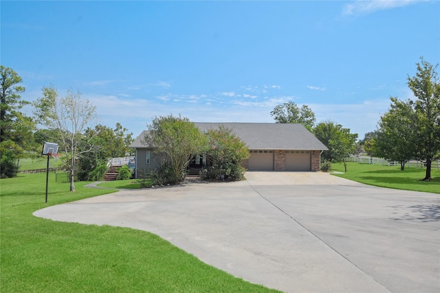 view of front facade featuring brick siding, concrete driveway, stairway, a garage, and a front lawn