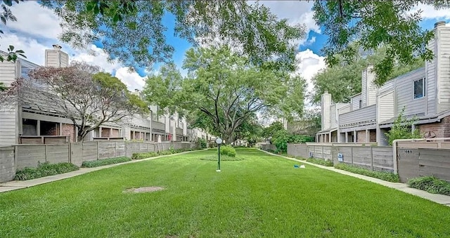 view of yard featuring fence