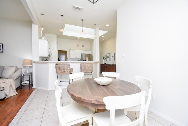 dining room with recessed lighting, visible vents, baseboards, and light tile patterned floors