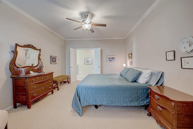 bedroom with light colored carpet, ornamental molding, ceiling fan, a textured ceiling, and baseboards