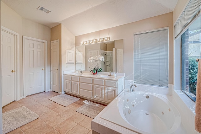 bathroom featuring a whirlpool tub, a sink, visible vents, and a shower stall