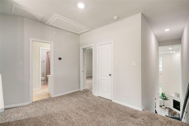 unfurnished bedroom with carpet flooring