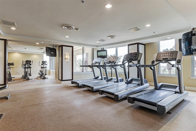 exercise room featuring recessed lighting, visible vents, and baseboards