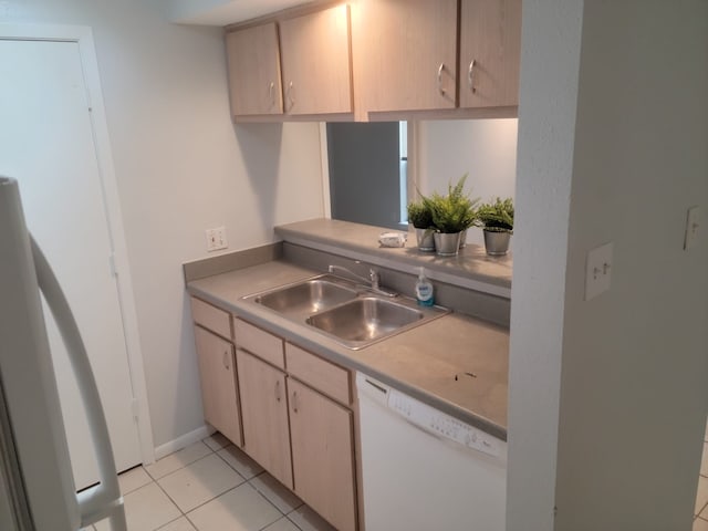 1516 Bay Area Blvd Unit S6, B9, E7, S11, K15, K3, Houston, TX 77058 - kitchen with light tile patterned flooring, light countertops, a sink, white dishwasher, and light brown cabinetry