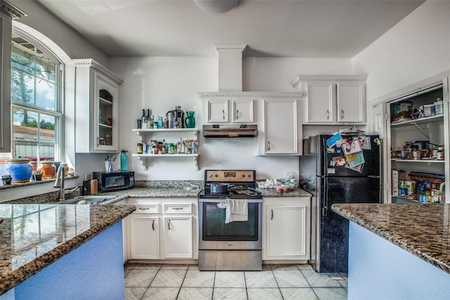 kitchen with light tile patterned flooring, sink, black appliances, dark stone counters, and white cabinets