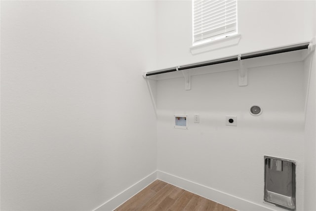 32626 Fly Fish Way, Fulshear, TX 77441 - washroom featuring washer hookup, electric dryer hookup, gas dryer hookup, wood finished floors, and baseboards