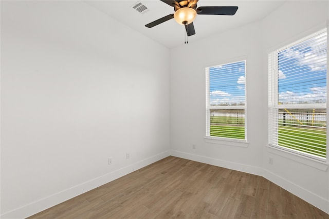 32626 Fly Fish Way, Fulshear, TX 77441 - spare room with baseboards, light wood-style flooring, and a ceiling fan