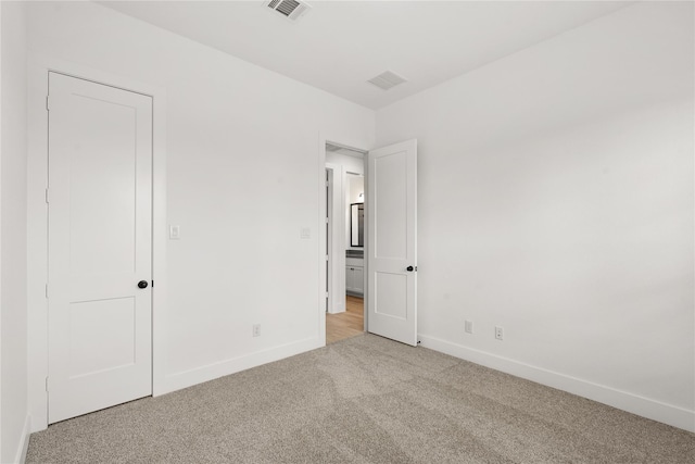 32626 Fly Fish Way, Fulshear, TX 77441 - unfurnished bedroom featuring carpet and baseboards