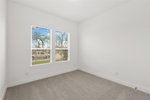 32626 Fly Fish Way, Fulshear, TX 77441 - spare room with light carpet and baseboards
