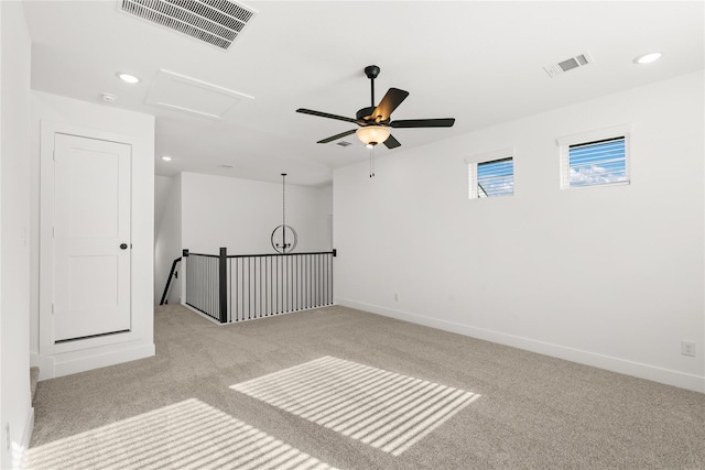 32626 Fly Fish Way, Fulshear, TX 77441 - unfurnished room with carpet, recessed lighting, a ceiling fan, baseboards, and attic access
