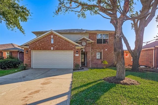 view of property with a garage and a front lawn