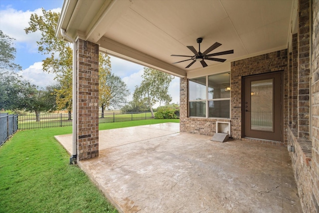 view of patio / terrace with a fenced backyard and ceiling fan