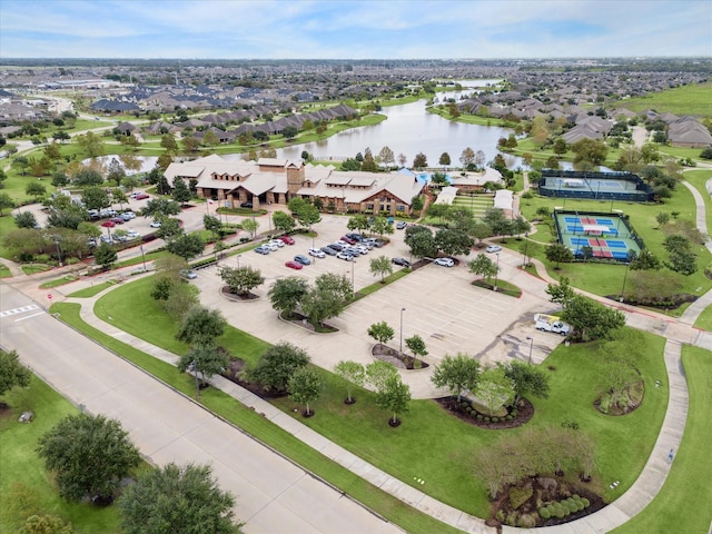 aerial view featuring a residential view and a water view