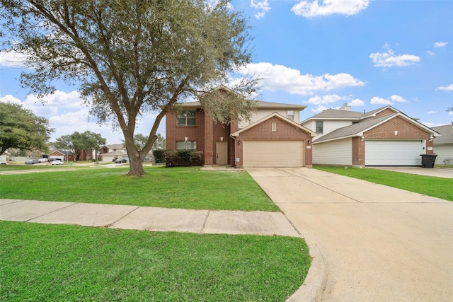 view of front of house with a garage and a front lawn