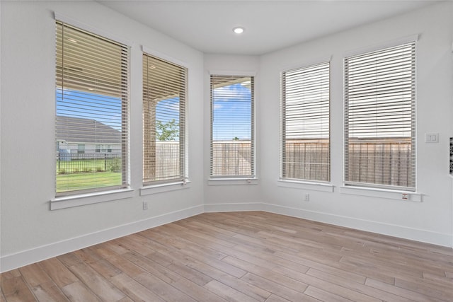 32646 Fly Fish Way, Fulshear, TX 77441 - unfurnished room with baseboards, light wood-type flooring, and recessed lighting