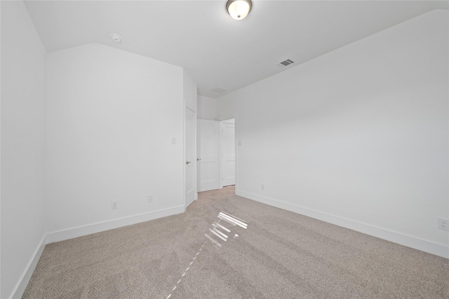 32646 Fly Fish Way, Fulshear, TX 77441 - carpeted empty room featuring baseboards, vaulted ceiling, and a smoke detector