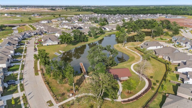 32646 Fly Fish Way, Fulshear, TX 77441 - aerial view of property and surrounding area featuring nearby suburban area and a large body of water