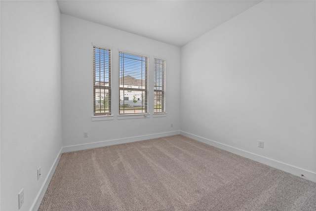 32646 Fly Fish Way, Fulshear, TX 77441 - empty room featuring light carpet and baseboards